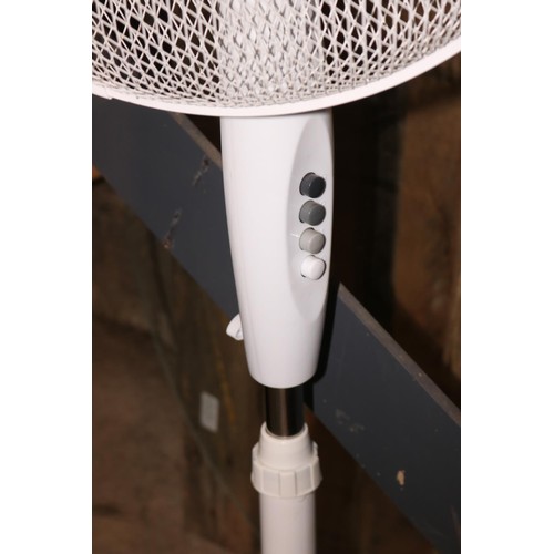 136 - Standing electric fan - warranted until 12 noon Tuesday following the above sale