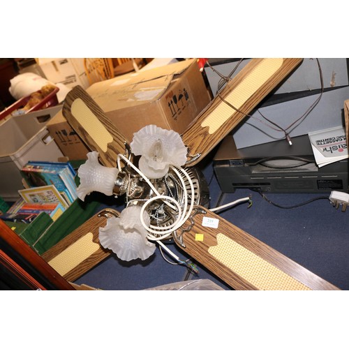 219 - Lamp, fan & 6 rolls of curtain fabric - to be installed by a qualified electrican