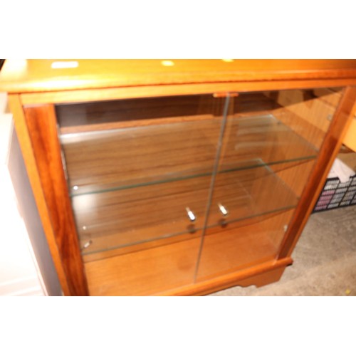 593 - Glass fronted cabinet