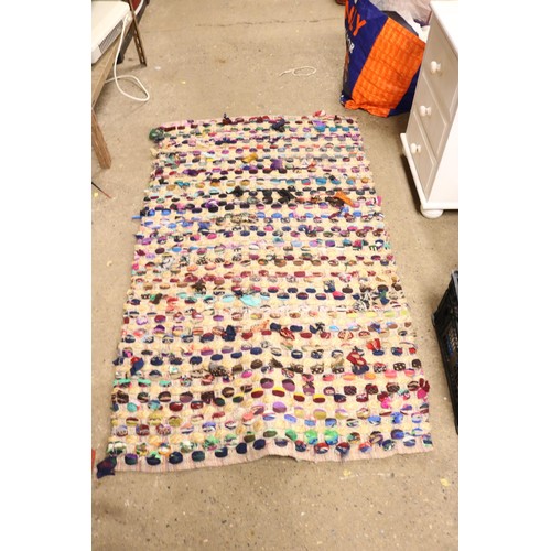 133 - Large patterned peg style rug