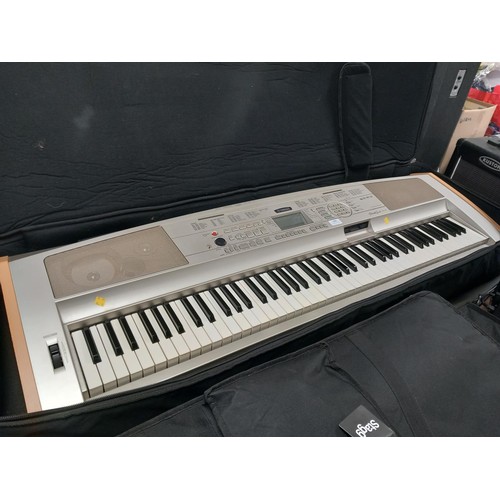 100 - Yamaha portable grand D6X-500 with gator case - warranted until 12 noon Tuesday following the above ... 