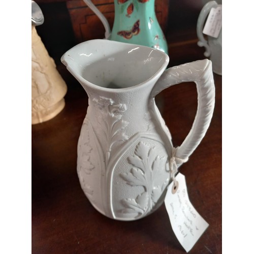 517 - 9 Victorian relief moulded jugs