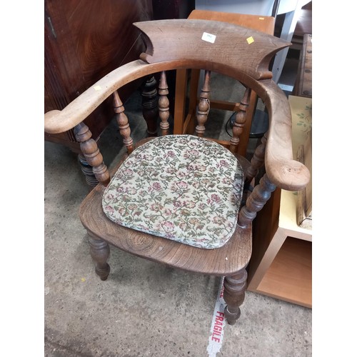 594 - Antique smokers bow/captains chair