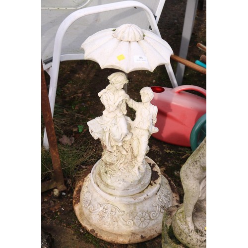 53 - Garden ornament, lovers under brolly