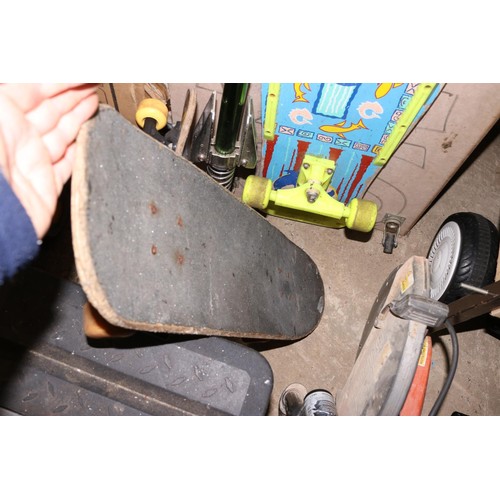 119 - 3 vintage skateboards & a pogo stick