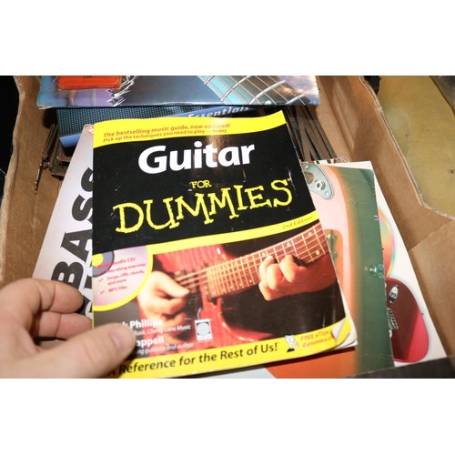 205 - Box of music stands & guitar music books