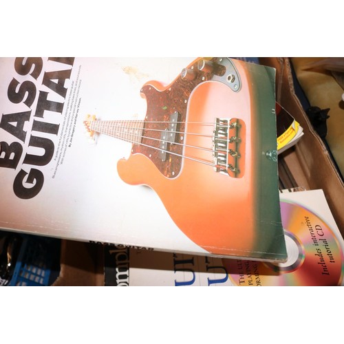 205 - Box of music stands & guitar music books