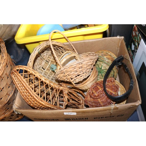 243 - Small box of wicker ware, wicker bin, baskets, etc