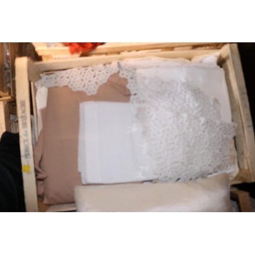 260 - 8 trays of various materials, lace, towels, etc