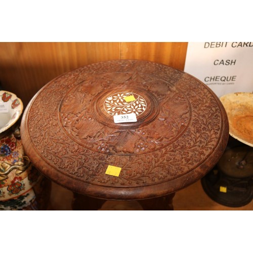 352 - Small carved round table