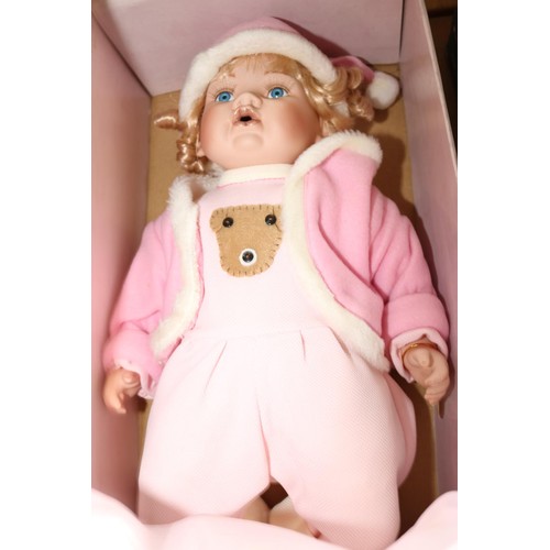 360 - The Leonardo collection porcelain baby doll