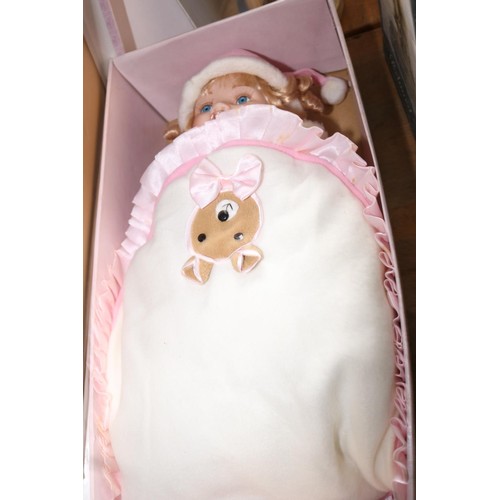 360 - The Leonardo collection porcelain baby doll