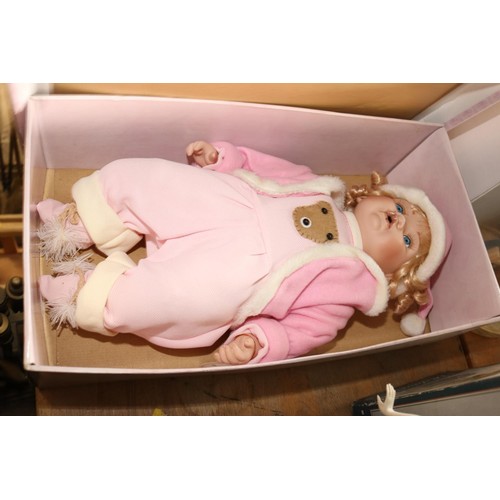 360 - The Leonardo collection porcelain baby doll