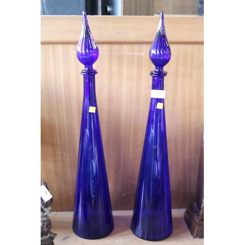 378 - 2 large blue glass ornaments with stoppers