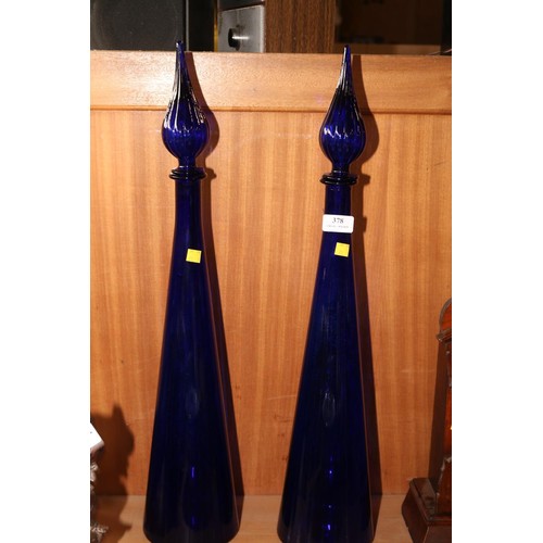 378 - 2 large blue glass ornaments with stoppers