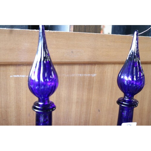 378 - 2 large blue glass ornaments with stoppers