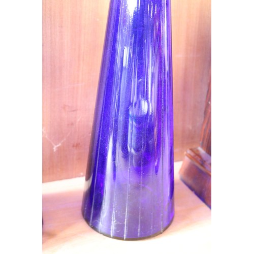 378 - 2 large blue glass ornaments with stoppers