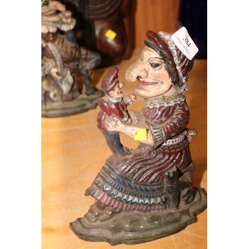 384 - Punch & Judy metal door stops