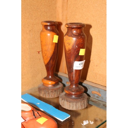 430 - Pair of wooden candle sticks