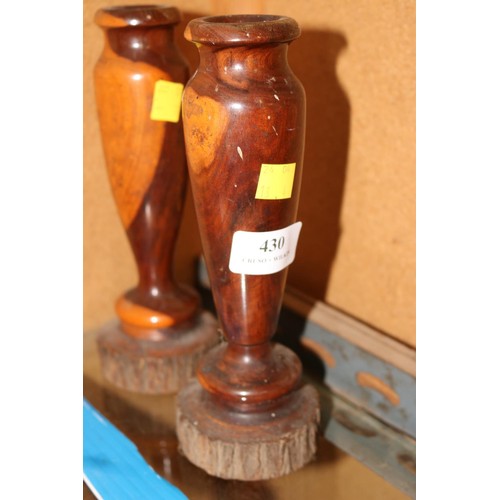 430 - Pair of wooden candle sticks