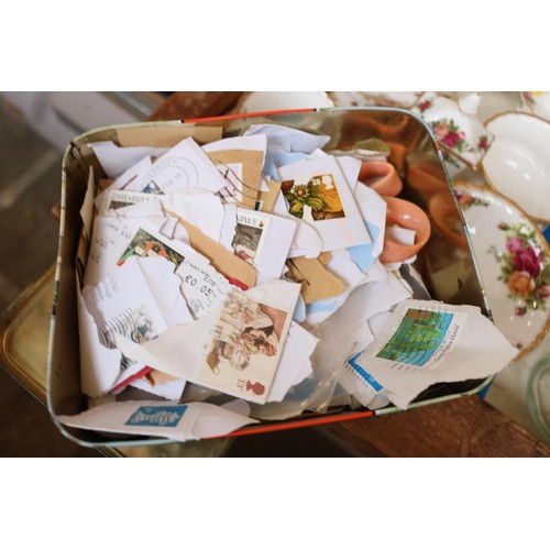 467 - 2 tins of various stamps