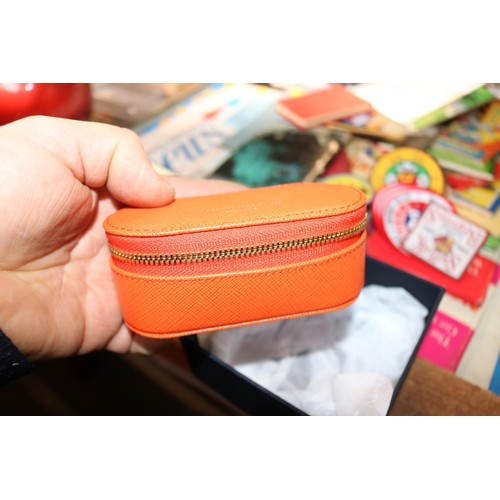 484 - New Aspinal of London orange handbag tidy