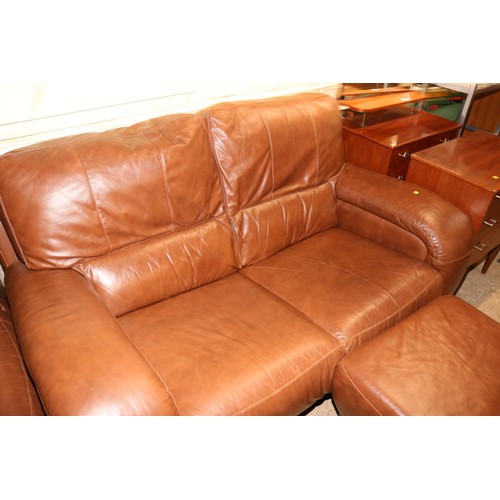 593 - 2x 2-seater brown leather style sofas & foot stool