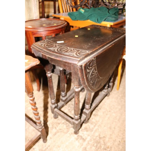 610 - Drop leaf carved table