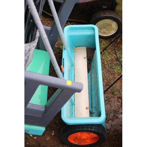 38 - Lawn spreader, hose reel, garden bag, kneeler