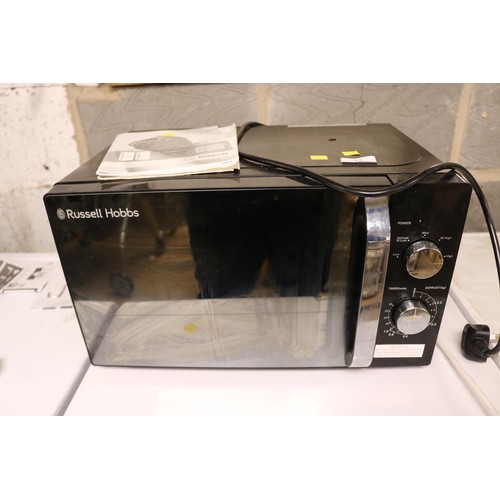 92 - Russell Hobbs microwave - warranted until 12 noon Tuesday following the above sale