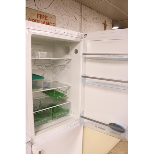 96 - Bosch fridge freezer with instructions - warranted until 12 noon Tuesday following the above sale