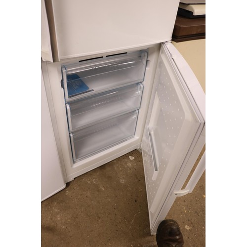 96 - Bosch fridge freezer with instructions - warranted until 12 noon Tuesday following the above sale