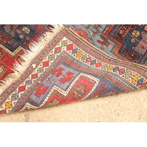 106 - 2 patterned rugs