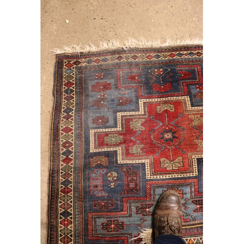 106 - 2 patterned rugs