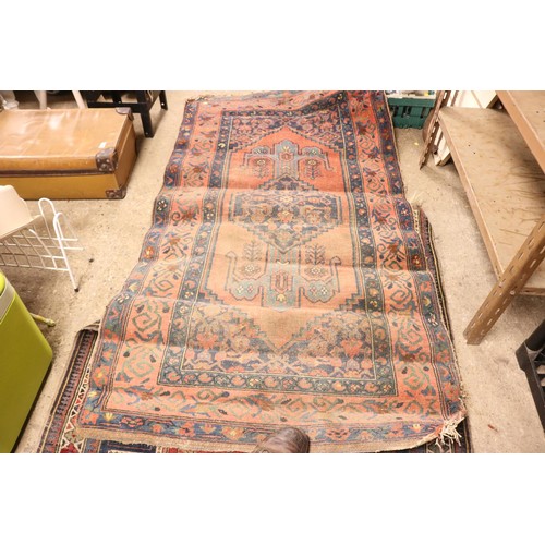 106 - 2 patterned rugs