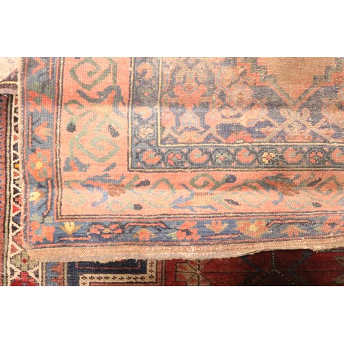 106 - 2 patterned rugs