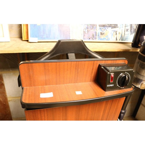 128 - Corby trouser press - warranted until 12 noon Tuesday following the above sale