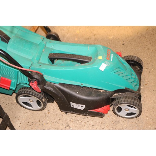 309 - Bosch Roark 34 R Electric lawnmower-warranted until 12 noon Tuesday following the above sale