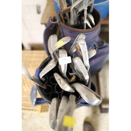 136 - 2 bags of various golf clubs