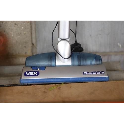 166 - Vax cordless slider vacuum cleaner with charger - warranted until 12 noon Tuesday following the abov... 