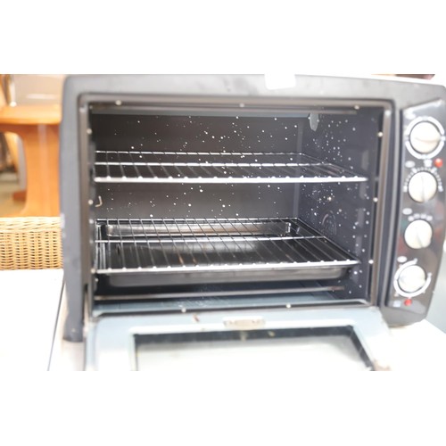 204 - Tabletop oven - warranted until 12 noon Tuesday following the above sale