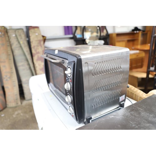 204 - Tabletop oven - warranted until 12 noon Tuesday following the above sale