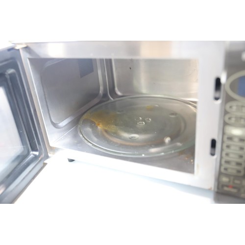 205 - Panasonic microwave - warranted until 12 noon Tuesday following the above sale