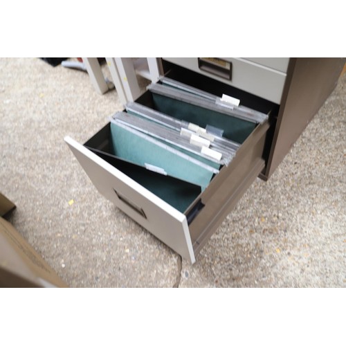 219 - Low metal 4 drawer filing cabinet