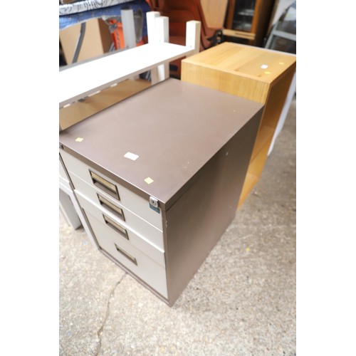 219 - Low metal 4 drawer filing cabinet