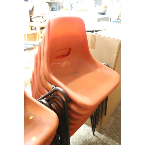 223 - 12 vintage stacking chairs, orange seats & tubular frames