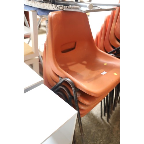 223 - 12 vintage stacking chairs, orange seats & tubular frames