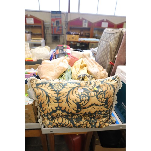 337 - 2 boxes of mixed cushions, blankets & rows, etc