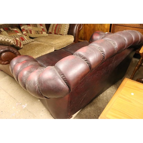 647 - 2 seater red leather chesterfield style sofa