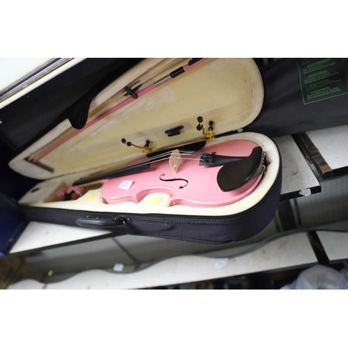 235 - Pink violin in case with stand